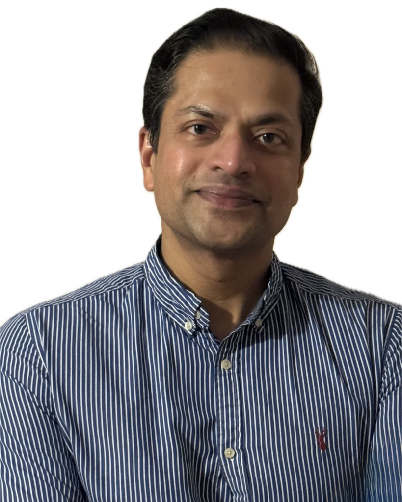 Head-and-shoulders portrait of a smiling man in a blue and white striped button-down shirt.